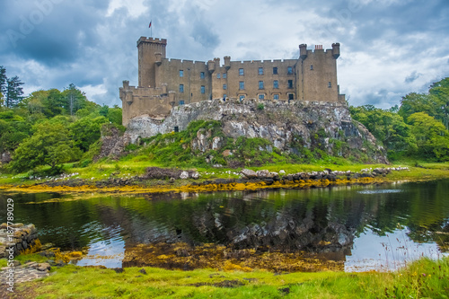 Dunvegan Castle on the Isle of Skye  Highlands of of Scotland. Seat of the MacLeod Clan. Built on an elevated rock overlooking Loch Dunvegan.
