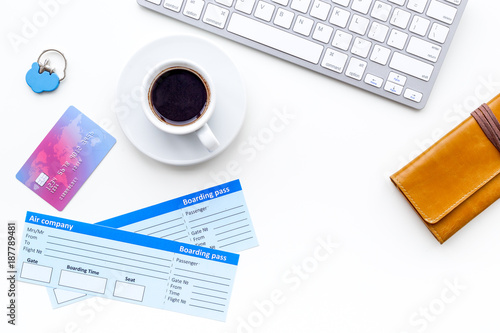 Book airplane ticket online. Documents near bank card, wallet, coffee and keyboard on white background top view