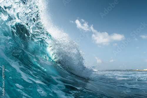 Perfect ocean wave breaking on the shore. Surfspot named Jailbreak, Maldives