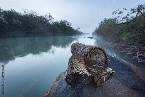 Cestos, armadilhas artesanais para pesca no rio Cubango em Angola	 photo