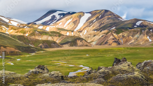 The stunning landscapes of Landmannalaugar in the Fjallabak Nature Reserve at the edge of the Laugahraun lava field in the Highlands of Iceland.
