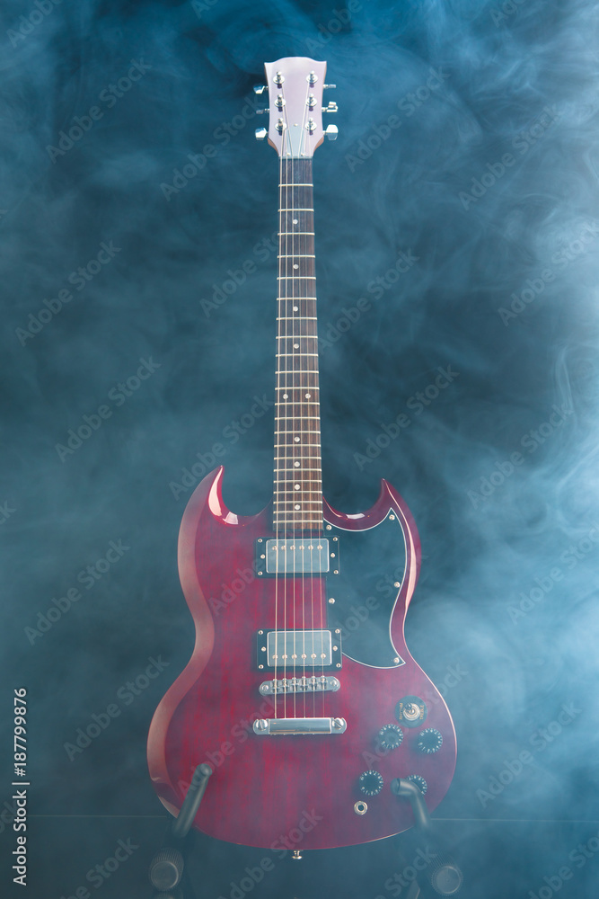 Fototapeta premium electric guitar in dense smoke