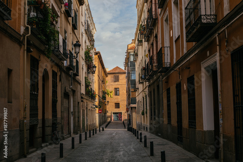 Fototapeta Naklejka Na Ścianę i Meble -  Road Between Buildings in Spain
