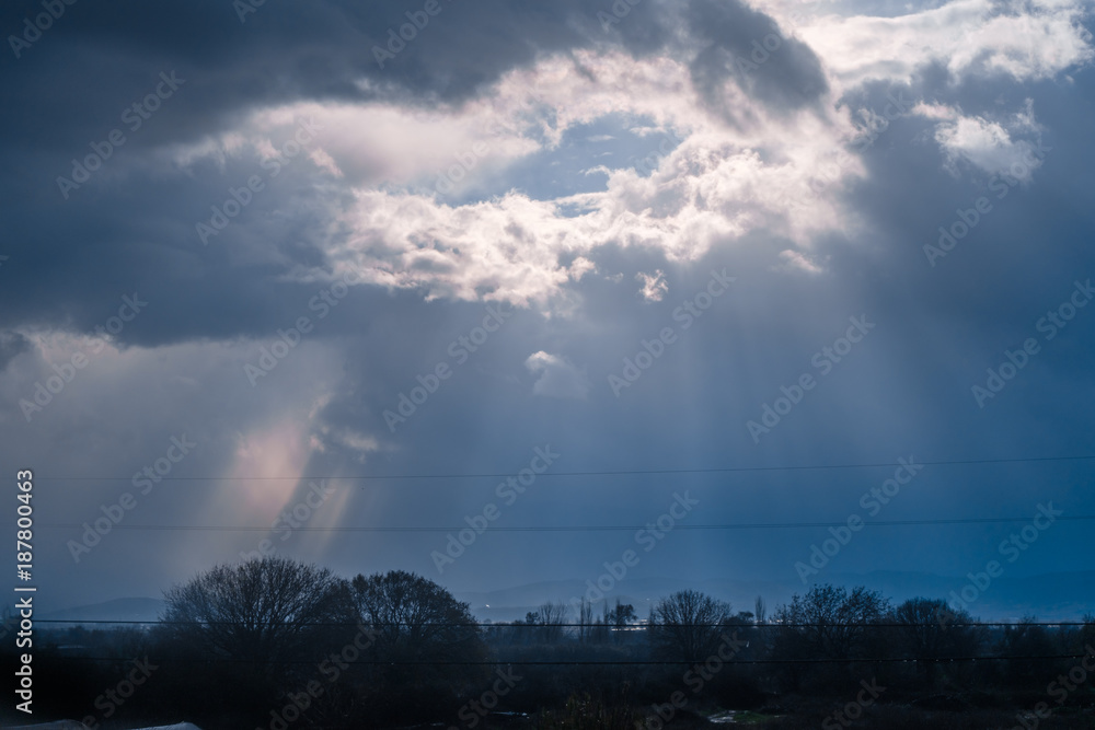 Rays of Sunlight Filtering Through the Clouds