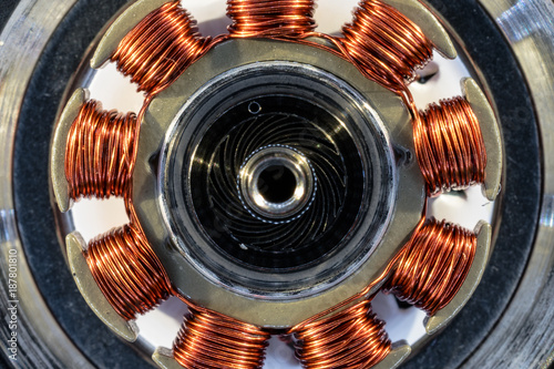 Fototapeta detail of an electric motor of a computer hard disk