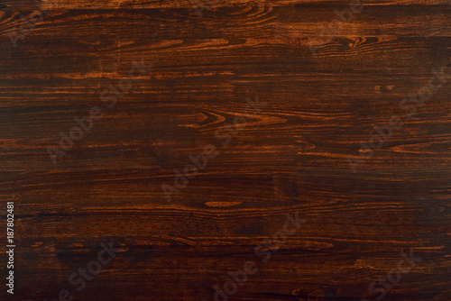 photo of natural wood for background or texture, dark red color