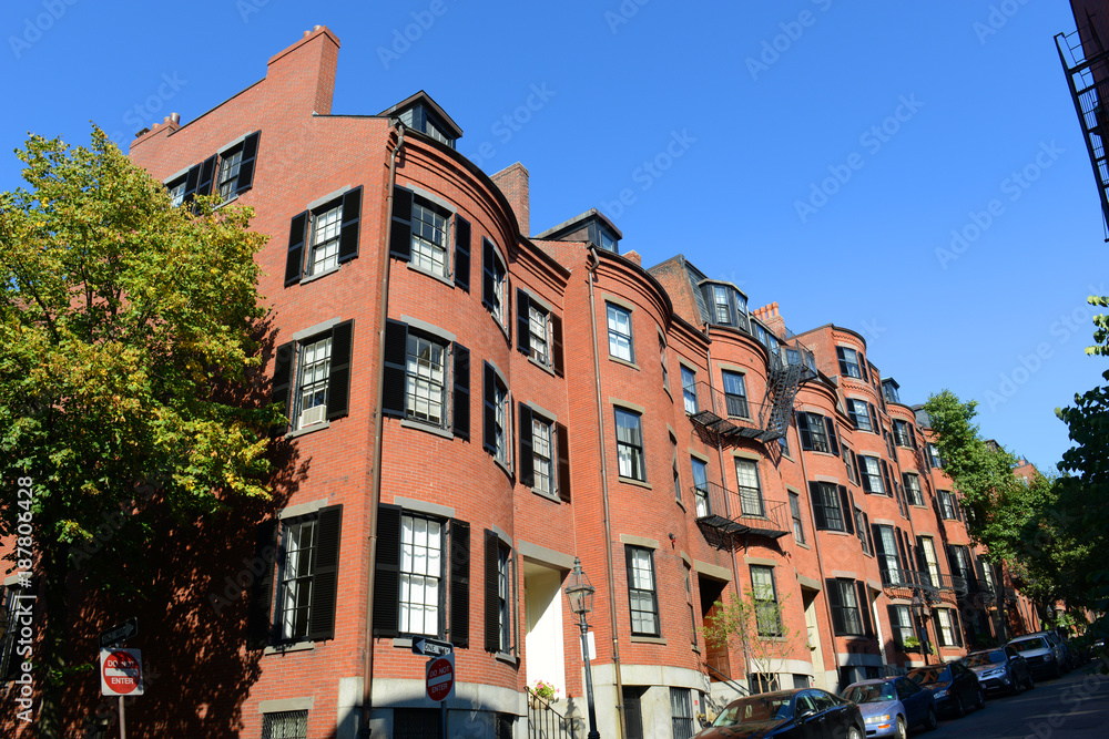 Historic Buildings on Pinckney Street at West Cedar Street on Beacon Hill, Boston, Massachusetts, USA.