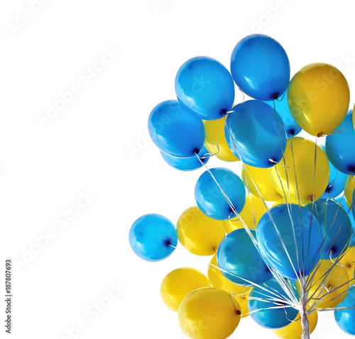 bunch  of blue and yellow  balloons in the city festival isolated on white background 