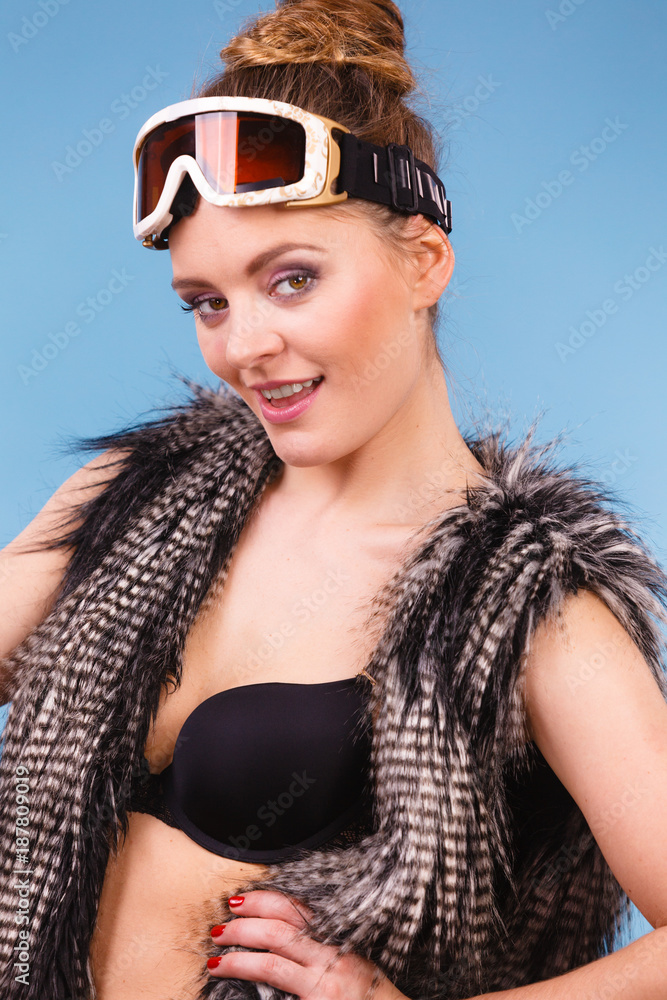 Woman skier girl wearing warm clothing ski goggles Woman skier girl wearing warm clothing ski goggles