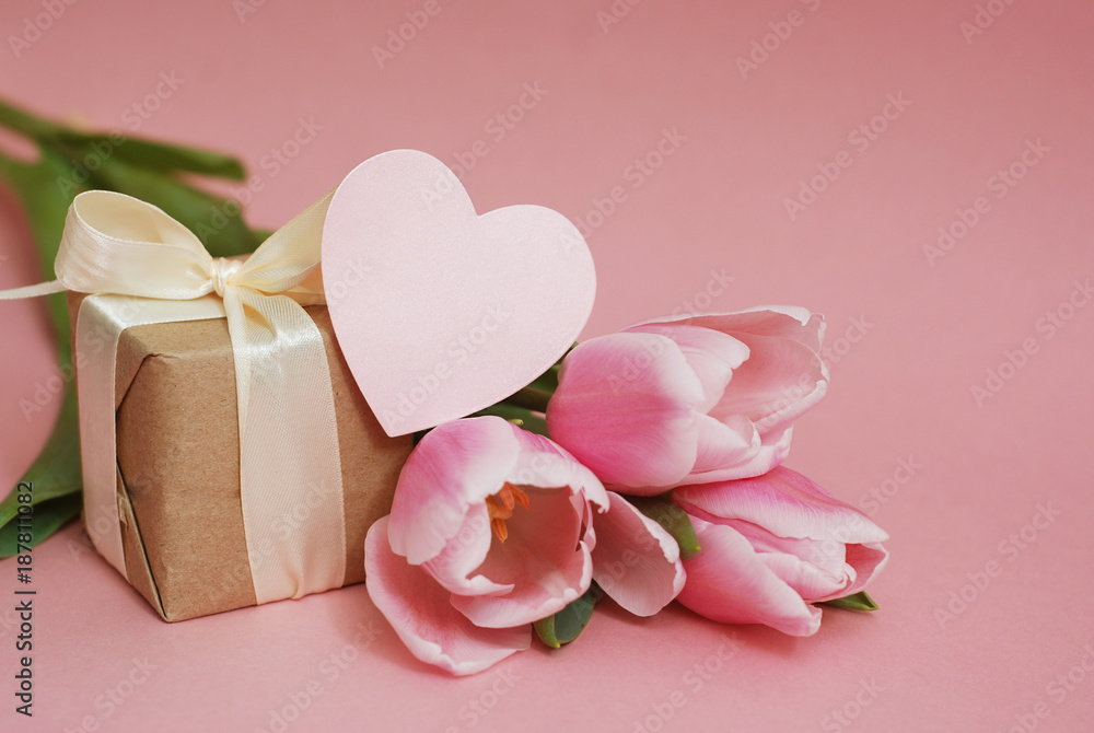 Bouquet of Pink Tulip Flower for Mother's Day or Valentine's Day or Women's Day on Pink Background with Heart. Copy Space. Bouquet of Pink Tulip Flower for Mother's Day or Valentine's Day or Women's Day on Pink Background with Heart. Copy Space.
