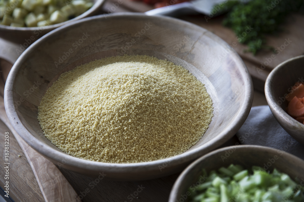 Couscous in Wooden Bowl Couscous in Wooden Bowl