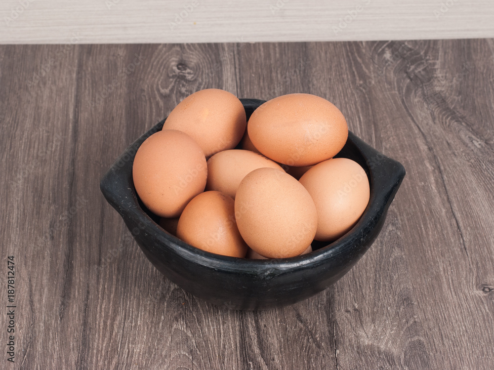 Brown eggs on wooden background Brown eggs on wooden background