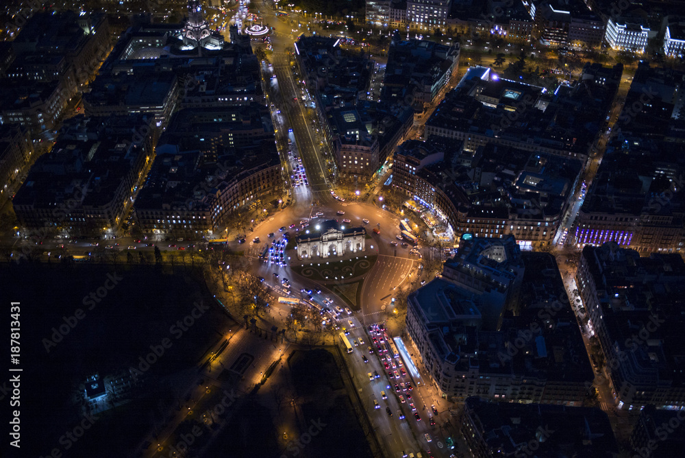 Panoramic aerial view of Puerta de Alcala day to night, main shopping street in Madrid Skyline Old Town Cityscape, Metropolis Building lights turn on, capital of Spain, Europe