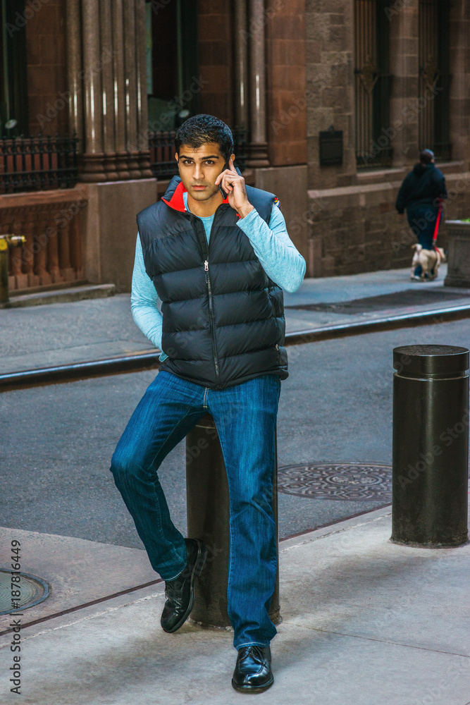 Auckland Heel veel goeds Panter East Indian American College Student wearing long sleeve T shirt, blue down  vest, jeans, leather shoes,