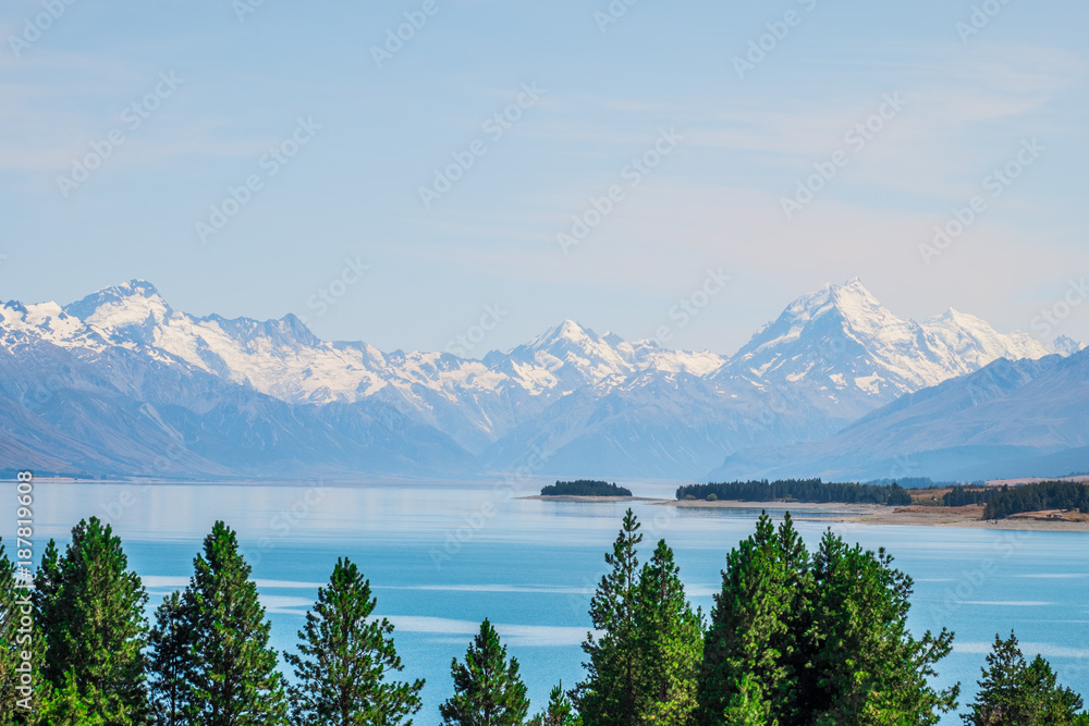 Beautiful scene of Mt Cook in summer beside the lake with blue sky. New Zealand Beautiful scene of Mt Cook in summer beside the lake with blue sky. New Zealand
