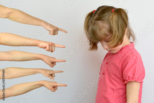 offended child showing thumbs