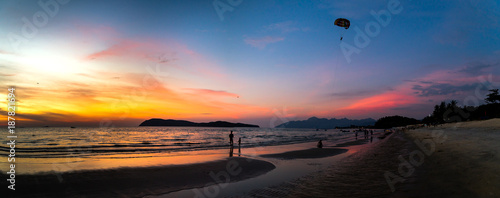 Sunset in Pantai Tengah beach, Langkawi, Malaysia. photo