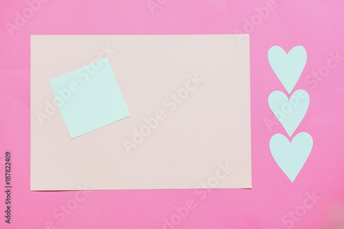 Paper pink background with empty notes. The concept of Valentine Day or bloggers. Flat Lay, top view © svetlanafoto