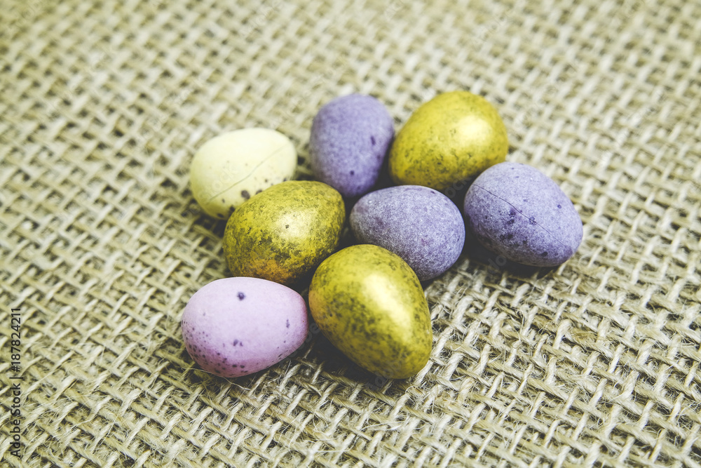 Chocolate Easter Eggs on a Cloth Background Chocolate Easter Eggs on a Cloth Background