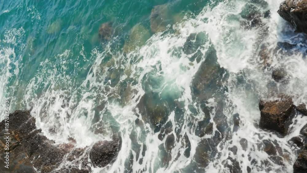 The Waves Crash on the Rocks of the Shore The Waves Crash on the Rocks of the Shore