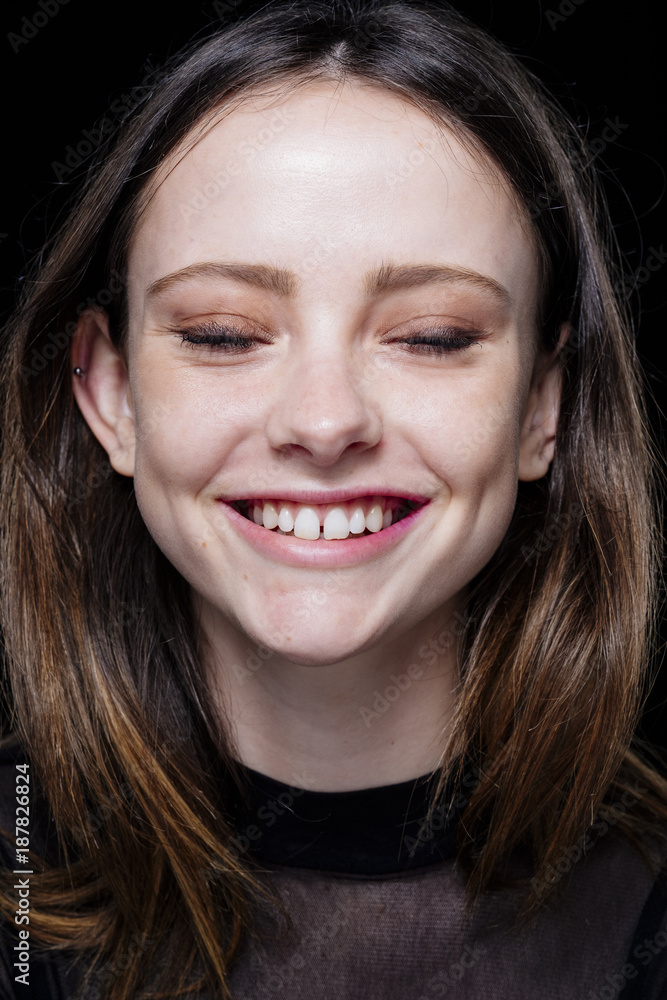 Smiling Caucasian woman with eyes closed Smiling Caucasian woman with eyes closed
