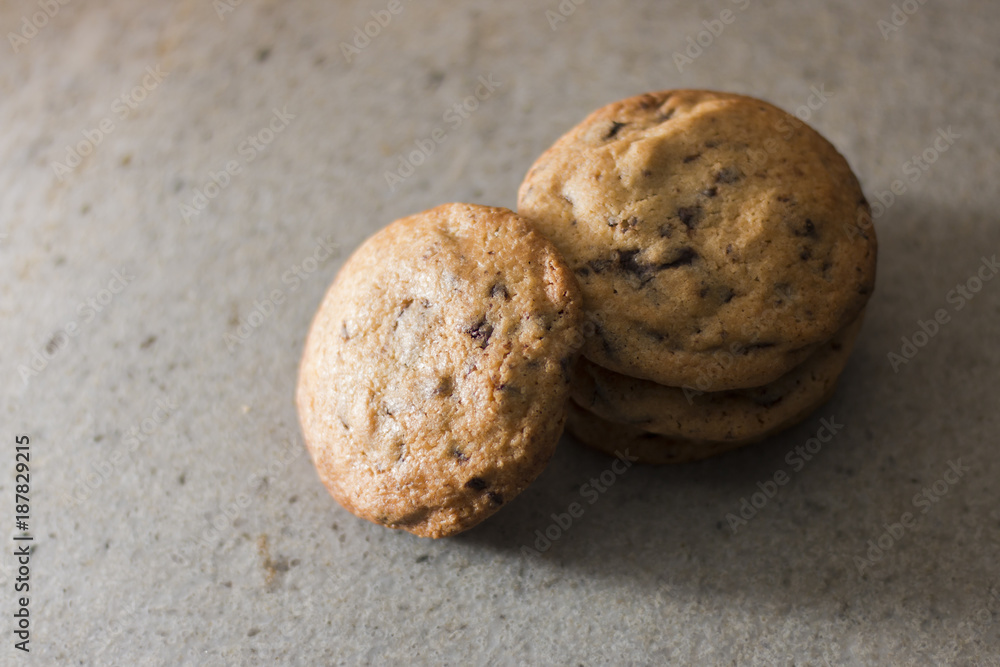 Chocolate cookies on stone table. Chocolate cookies on stone table.