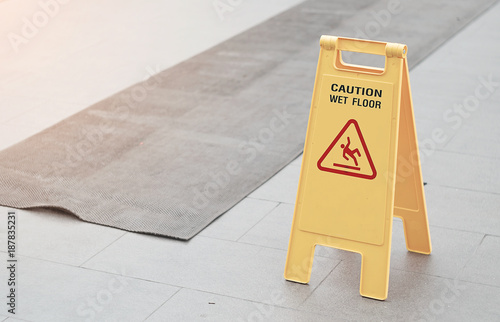 Caution wet floor place on the floor after raining.