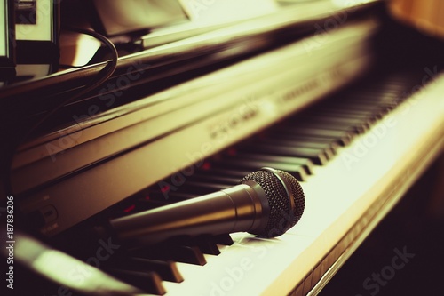 Piano keyboard and microphone