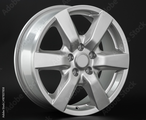 Aluminum metal wheel rim texture. Car alloy wheel, isolated on black background