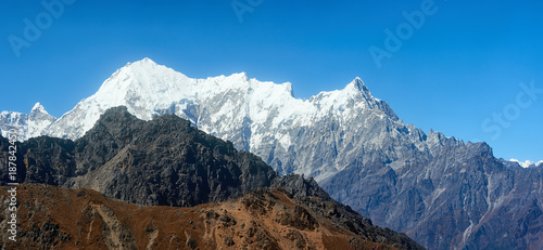 Panorama of winter mountains in national park Lantang, Nepal. © soft_light
