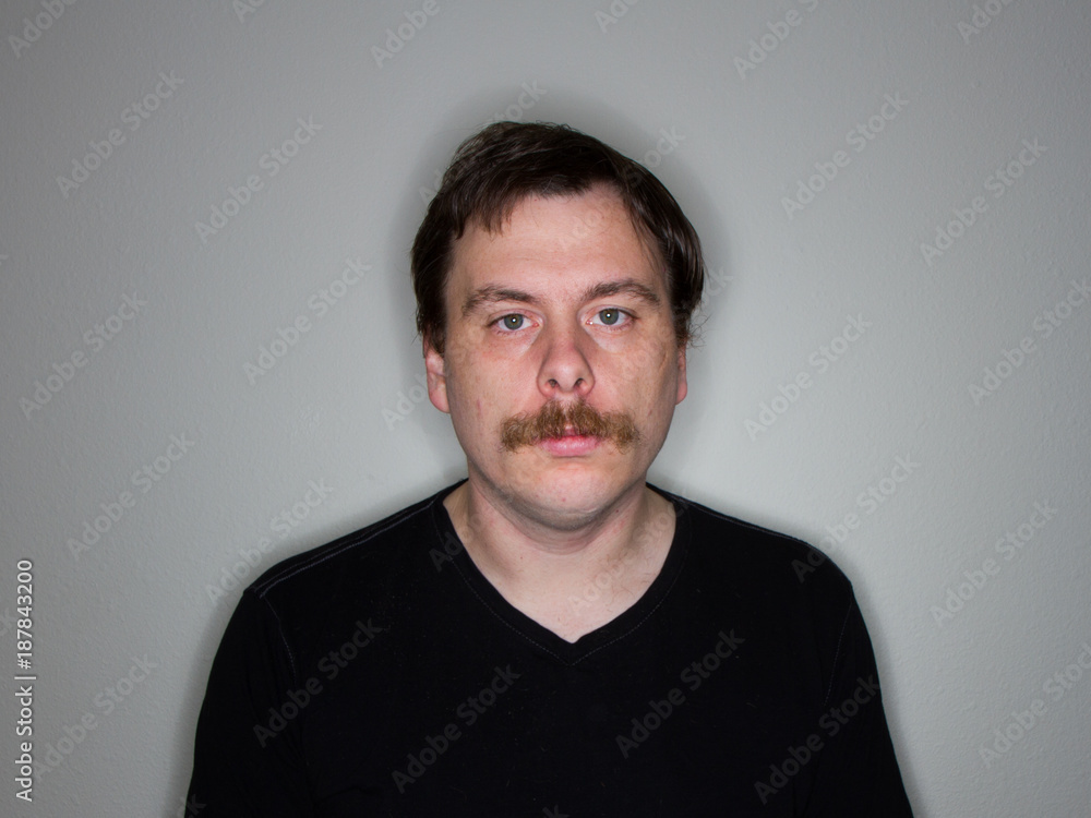 Obraz premium mustached man with a blank face