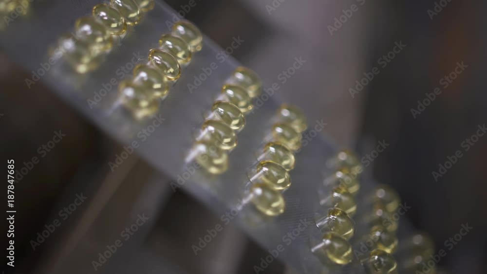Pharmaceuticals and drugs, view of large number of gelatin capsules, amber color tablets in package.
Pharmaceuticals and drugs, view of large number of gelatin capsules, amber color tablets in package.