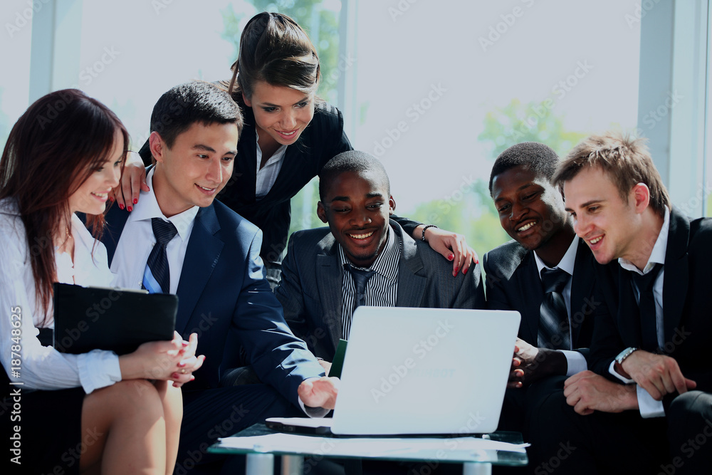 Happy working business team in modern office. Happy working business team in modern office.
