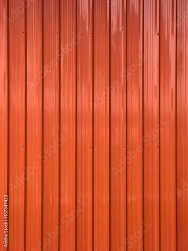 Orange color pattern metal sheet background.