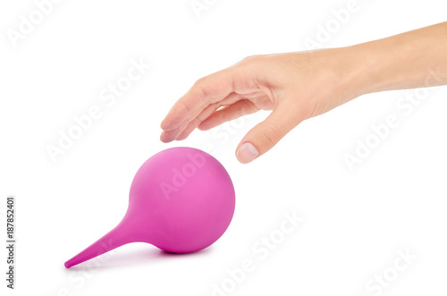 Obraz na płótnie female hand holding blue enema ot syringe bulb