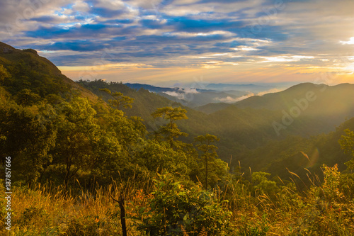 Photo landscape and sunset.The Sunset on the mountains. High Mountain in chaingrai province Thailand.