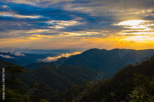 Photo landscape and sunset.The Sunset on the mountains. High Mountain in chaingrai province Thailand.