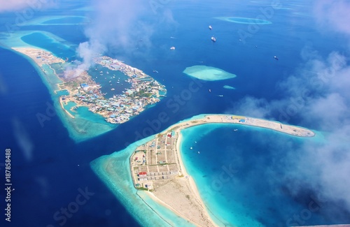 Aerial view of the lagoon of the airport island of Male' in the Maldives photo