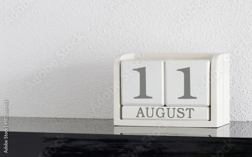 White block calendar present date 11 and month August