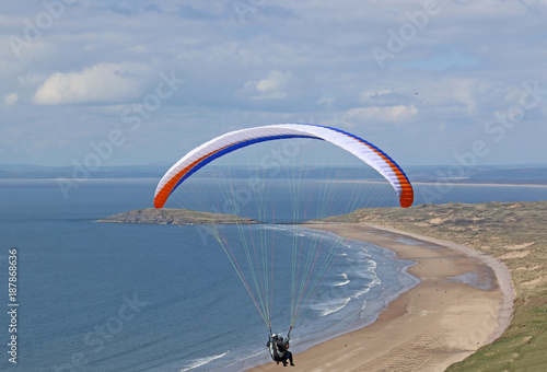 Paraglider above Rhossili Beach, Wales