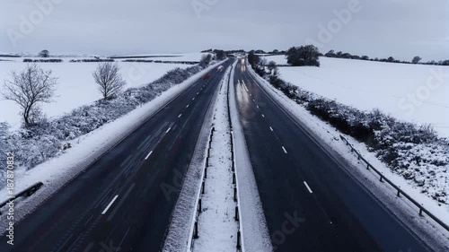 Cars Light Trails on Rural Motorway at Winter photo