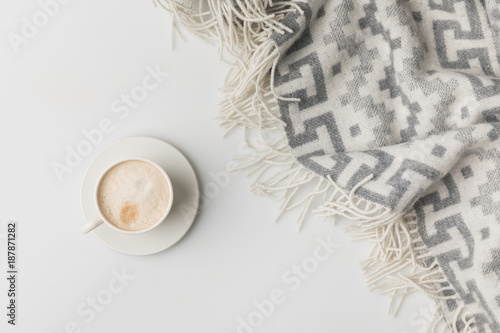 top view of coffe cup and blanket isolated on white