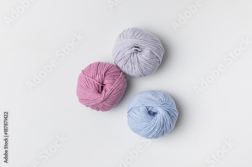 top view of colored yarn balls isolated on white