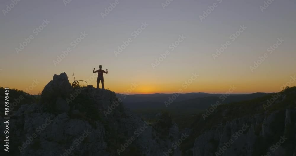 Aerial flight backwards - Solo climber reaching the top and celebrating right after sunset.
Aerial flight backwards - Solo climber reaching the top and celebrating right after sunset.