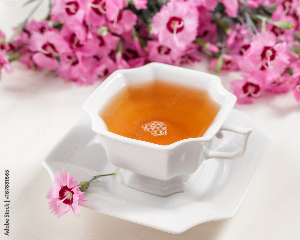 Cup of green tea on white table Cup of green tea on white table