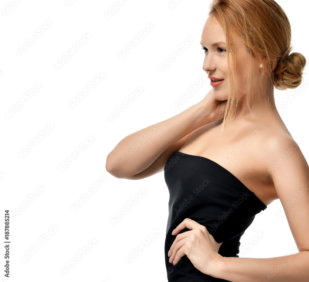 Closeup portrait of Young beautiful red hair woman posing in black dress Closeup portrait of Young beautiful red hair woman posing in black dress
