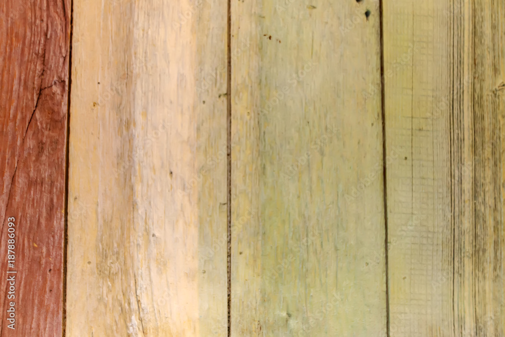 Fototapeta premium Textured surface of wooden boards painted in different colors