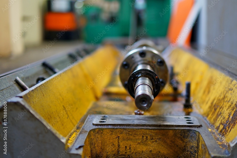 Repair of lathe, grinding machine, guiding and splined shaft. close up the details of the old machine
