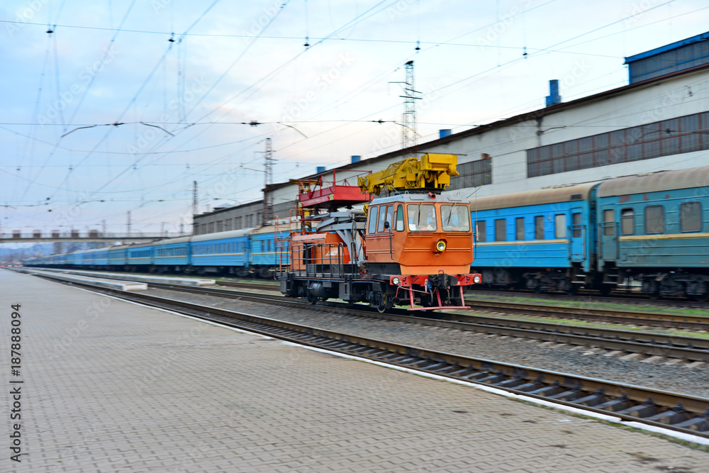 Passenger and freight train. Passenger diesel train traveling speed railway wagons journey light Passenger and freight train. Passenger diesel train traveling speed railway wagons journey light