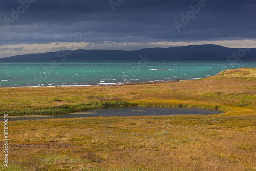 Impressive view of the stormy Barents sea in cloudy weather  short summer in Finnmark  Norway. Northernmost part of continental Europe